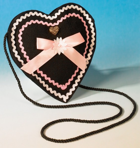 Bolso de traje tradicional negro y rosa en forma de corazón