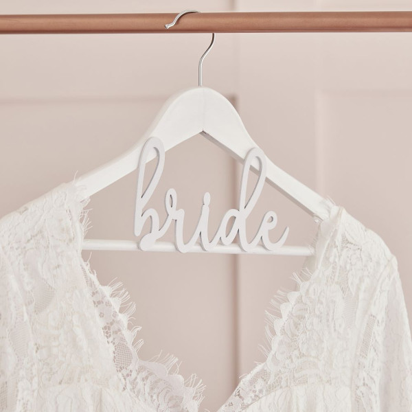 White wooden bride hangers