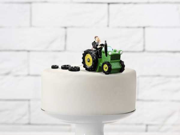 Landelijk de cakecijfer van het bruidspaar met tractor