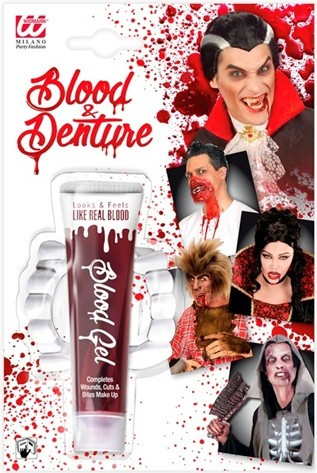 Fake blood in a tube with vampire teeth