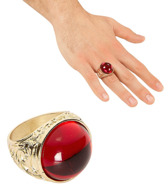 Golden ring with red stone
