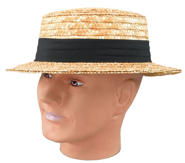 Turista de sombrero de paja con banda de sombrero