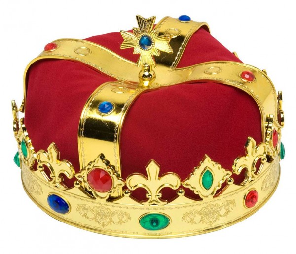 Królewska korona z kamieniami szlachetnymi i czerwoną poduszką