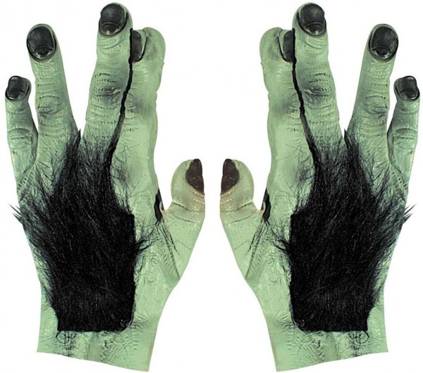Mains de monstre effrayant en vert