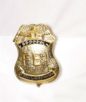 Gylden FBI-badge