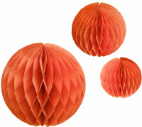 Widok: 3 pomarańczowe kulki ekologiczne o strukturze plastra miodu