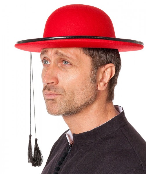 Czerwona czapka pastora z frędzlami