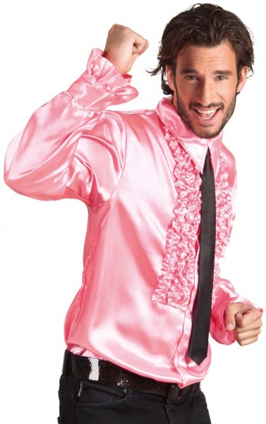 Różowa połyskująca koszula z falbanami