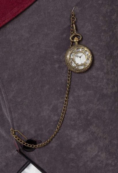 Gold-colored pocket watch with chain