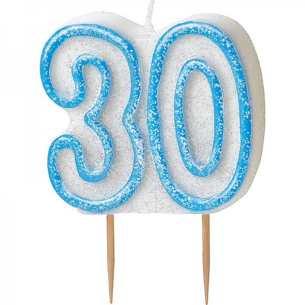 Candela blu brillante felice del trentesimo compleanno della torta