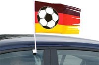 Torn car flag Germany with soccer ball