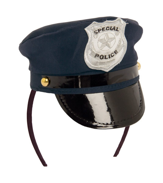Chapeau de police comme bandeau en bleu