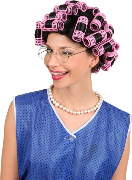 Black wig with pink curlers