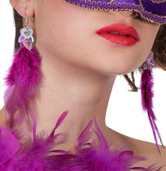 Roze kleurige oorbellen met glamour veren