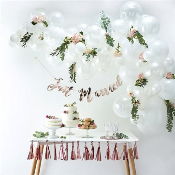 White balloon arch with 70 balloons