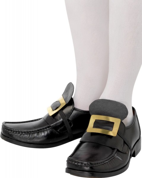 Gold-colored metal shoe buckles