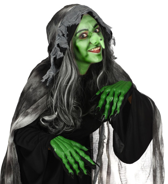 Halloweenowe rękawiczki przedstawiające zielone dłonie czarownicy