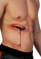 Widok: Nakładanie lateksu na duże krwawe rany
