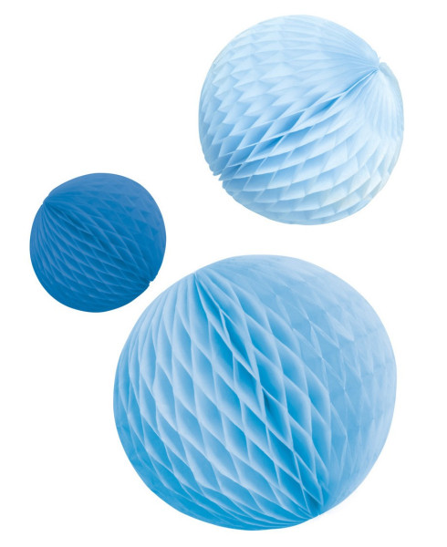 3 błyszczące niebieskie kulki o strukturze plastra miodu